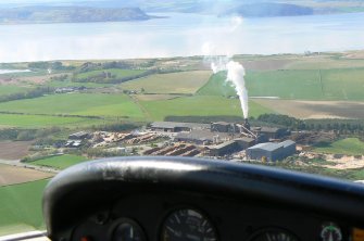 Aerial view of Norbord wood processing factory to Munlochy Bay, looking NW.