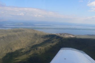 Oblique aerial view over Glensanda Quarry over the middle section of Lismore and towards Oban, Loch Linhe, looking SE.