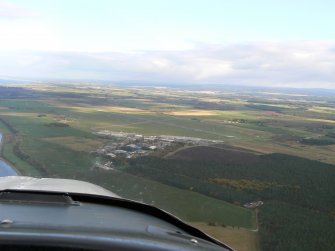 Aerial view of Inverness Airport, E of Inverness, looking SE.