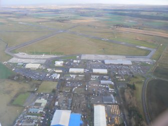 Aerial view of Dalcross Industrial Estate and Inverness Airport, looking ESE.