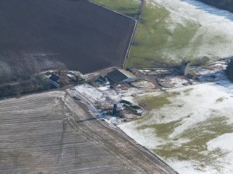 Aerial view of Fairburn Tower and Tower Mains, near Contin, Easter Ross, looking SE.