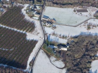 Aerial view of Aultgowrie and Aultgowrie Mill, near Muir of Ord, Easter Ross, looking NNW.