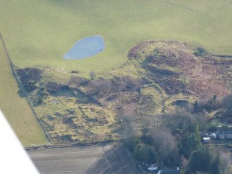 Aerial view of Mulchaich Chambered Cairn and settlement, Black Isle, looking NE.