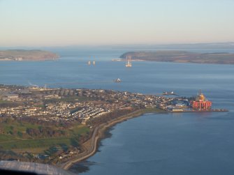 Aerial view of Invergordon with harbour and fuel tanks visible, Cromarty Firth, looking NE.