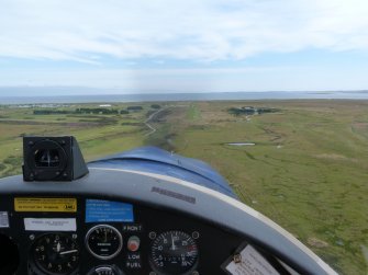 Aerial view of Dornoch Golf Course, caravan park and Airfield, East Sutherland, looking E.