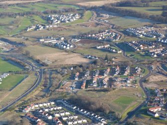 Aerial view of area to south of Southern Distributor Road at Culduthel Roundabout, Inverness, looking SE.