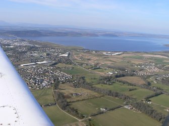 Aerial view of east side of Inverness and Moray Firth, looking N.