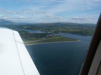 Aerial view over Oban Airfield (North Connel) and Falls of Lora and Loch Etive, looking SE.