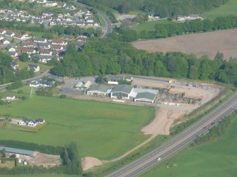 Aerial view of a close view of Simpson's garden centre, Inverness, looking SE.