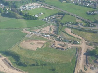 Aerial view of roadwork development to the east of Inverness, looking SE.