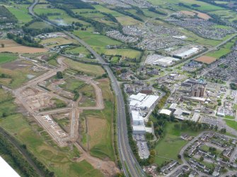Aerial view of Beechwood Farm development for new University Campus, Inverness, looking SE.