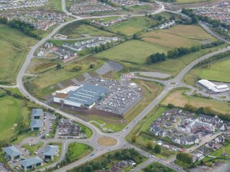 Aerial view of Asda Supermarket, Slackbuie, Inverness, looking SE.