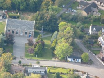 Aerial view of Kirkhill (Wardlaw) Parish Church of Scotland, and burial ground, Kirkhill, Inverness, looking NW.