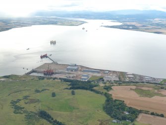 Aerial view of Nigg Fabrication Yard and Oil Terminal, Cromarty Firth, looking W.