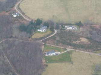 Aerial view of Balnaban modern settlement, Glenurquhart, W of Drumnadrochit, looking N.