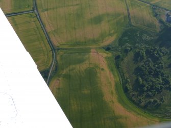 Aerial view of Balvattie/Gilchrist, Tarradale cropmark features, Muir of Ord, Black Isle, looking SW.