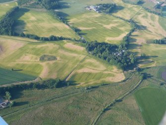 Aerial view of Tarradale House and cropmarked fields general views, Muir of Ord, Black Isle, looking NE.