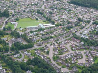 Aerial view of Lochardil Hotel and Primary School, Inverness, looking SSE.