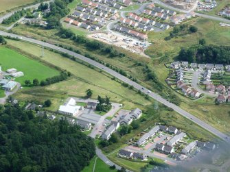 Aerial view of Inverness Ring Road and modern housing at Culduthel, Inverness, looking S.