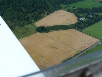 Aerial view of cropmarks in field near Dunain House, S of Inverness, looking N.