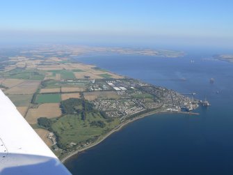 An oblique aerial view of Invergordon, Easter Ross, looking E.