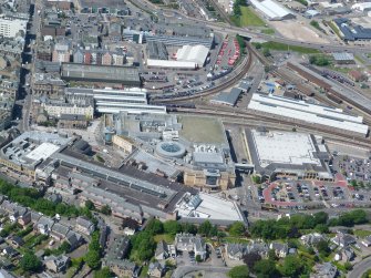 Aerial view of the Eastgate Centre and Inverness Railway Station, looking NW.