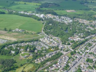 Aerial view of Muir of Ord, looking NW.