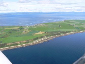 Aerial view of Portmahomack and Tarbat Ness, looking NW.