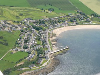Aerial view of Portmahomack harbour and village, Tarbat Ness, Easter Ross, looking S.