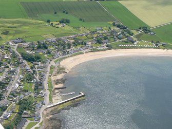 Aerial view of Portmahomack harbour and village, Tarbat Ness, Easter Ross, looking S.