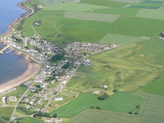 Aerial view of Portmahomack harbour and village, Tarbat Ness, Easter Ross, looking N.