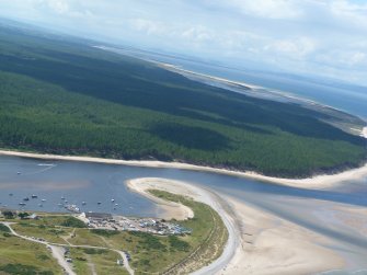 Oblique aerial view of much of Culbin Forest and shoreline, with the seaward tip of Findhorn in the foreground, Moray, looking SW.