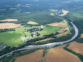 Aerial view of site of Forres Airfield at Mundole, Moray, looking SE.