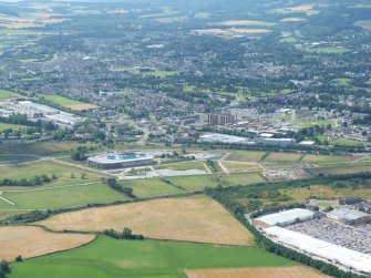 Oblique aerial view of UHI Inverness College at Beechwood, E of Inverness, looking SW.