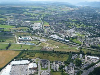 Oblique aerial view of UHI and Inverness College at Beechwood, Inverness, looking SW.