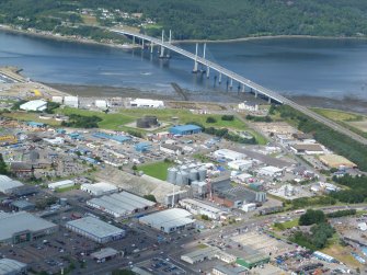 Oblique aerial View of the Longman Industrial Estate and Kessock Bridge, Inverness, looking NW.