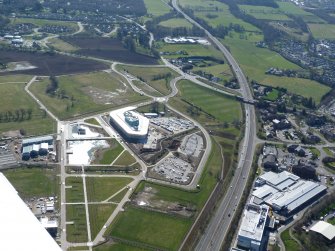 Oblique aerial view of Inshes and the A9, Inverness, looking SE.