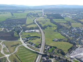 Oblique aerial view of Inshes and the A9, Inverness, looking SE.