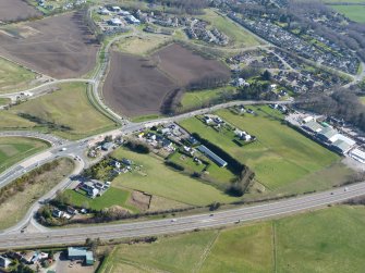 Oblique aerial view from A9 over Castlehill House, Inverness, looking E.