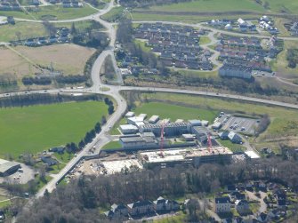 Aerial view of Inverness Royal Academy and Holm Farm residential area at Culduthel, Inverness, looking S.
