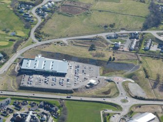 Aerial view of near vertical aerial view of the ASDA Superstore and part of Slackbuie beyond, Inverness, looking SE.