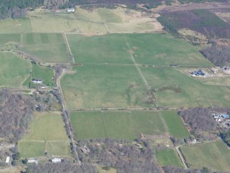 An oblique aerial view of croftlands west of Beauly, looking N.