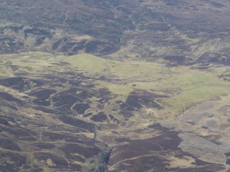 Oblique aerial view of the land of Urchany, near Farley, Beauly, looking WNW.