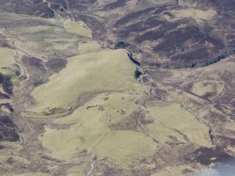 An oblique aerial view of the main settlement of Urchany, near Kilmorack, looking WSW.