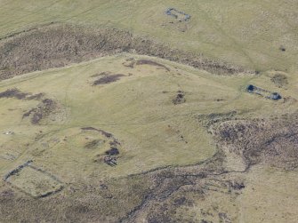 An oblique aerial view of the main settlement of Urchany, near Kilmorack, looking SW.