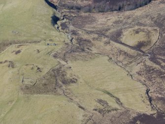 An oblique aerial view of the main settlement of Urchany, near Kilmorack, looking WSW.