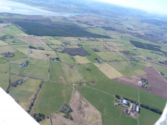 An oblique aerial view of Easter Ross croft land, at the west end of the Beauly Firth, looking S.