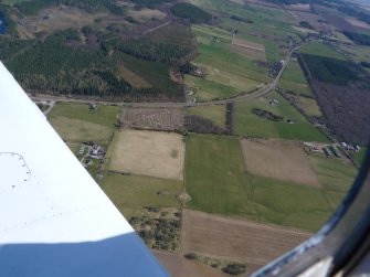 An oblique aerial view of Kilcoy croftlands, Easter Ross, looking ENE.