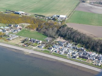 An oblique aerial view of Arderseir, on the Moray Firth, looking N.