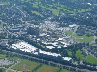 Aerial view of Lifescan building, Beechwood Business Park and Raigmore Hospital, Inverness, looking SW.